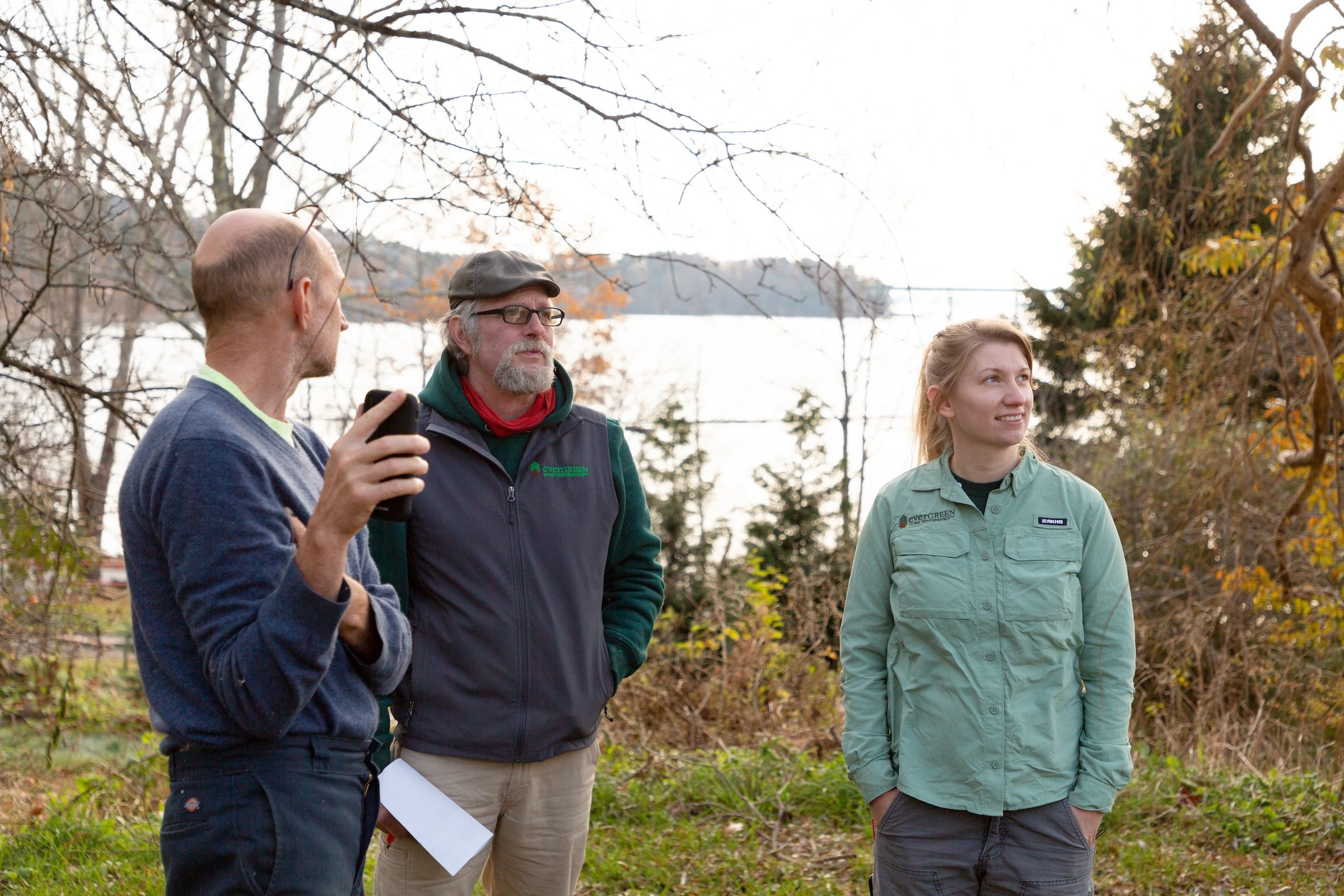 Evergreen team walking through a house