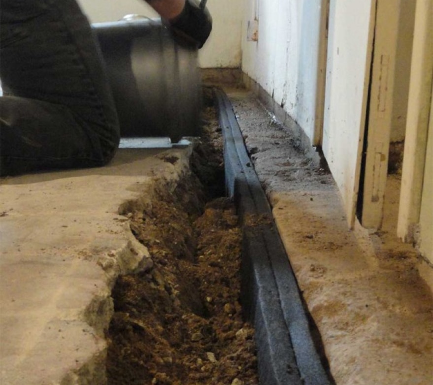 Hrdraway next to footer in basement