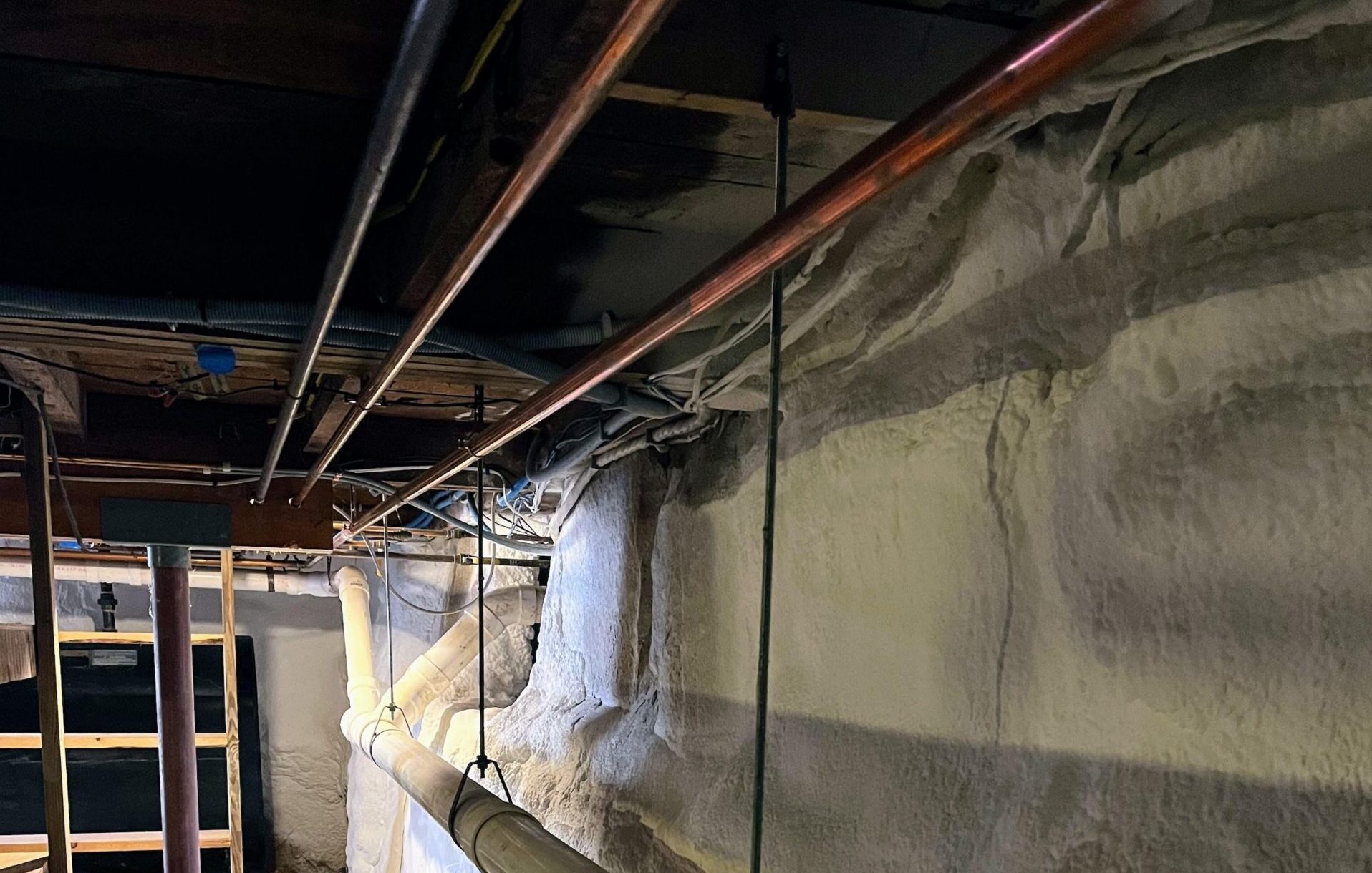 ehp_basement_waterproof_finished_wall_floor_hydraway_sprayfoam_vapor_barrier_installed_sept_2024 Spray foam insulation in basement