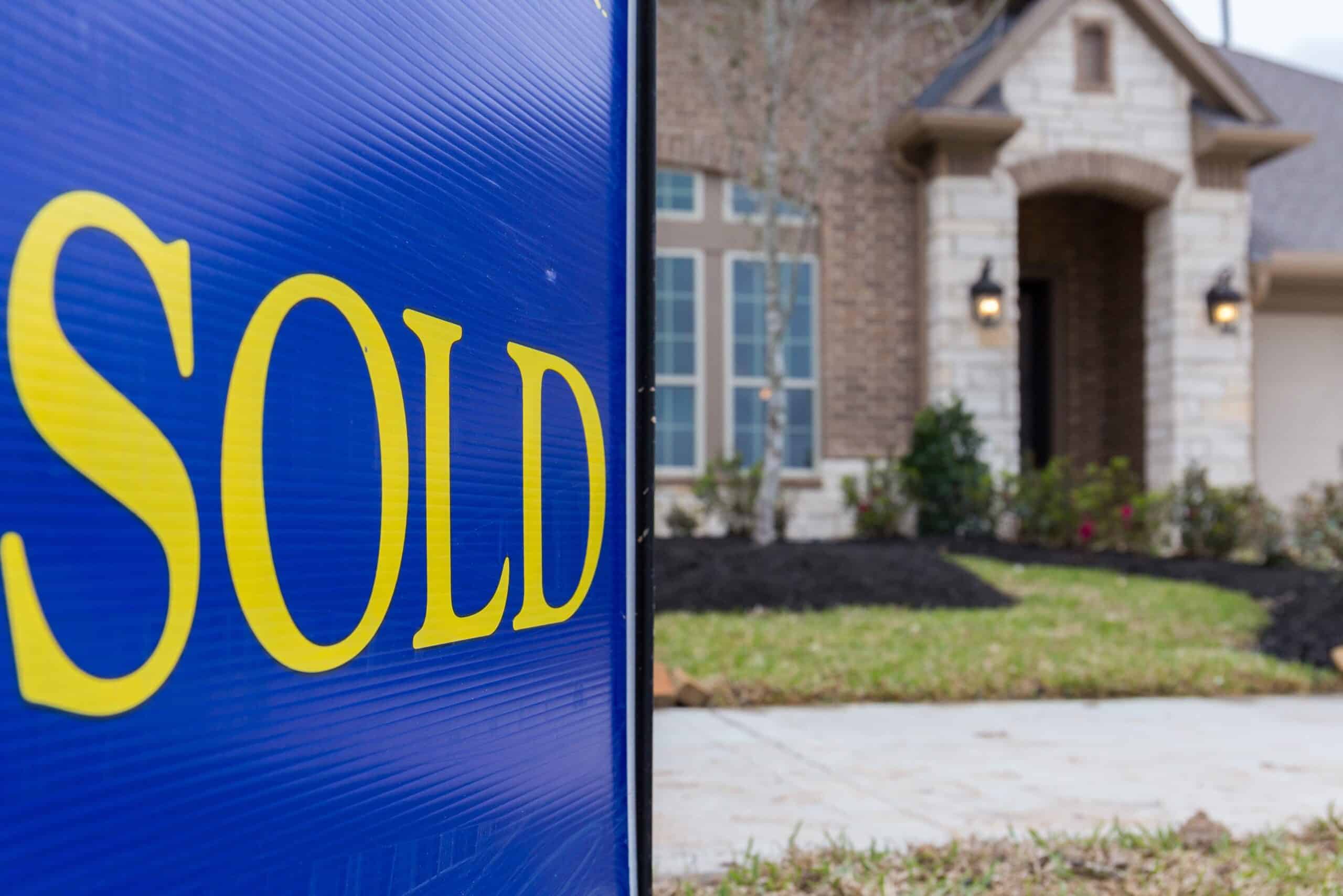 Sold sign outside house